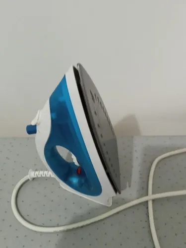 Tábua e ferro de passar roupa 