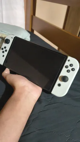 Nintendo switch OLED 64gb  1 jogo mídia física incluso 