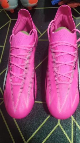 Chuteira puma rosa 1° linha profissional