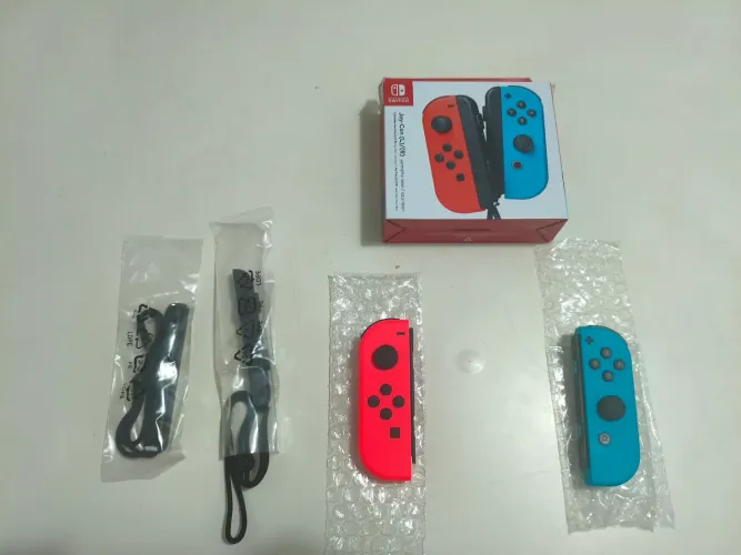 Joy-Con originais Nintendo Switch vermelho e azul