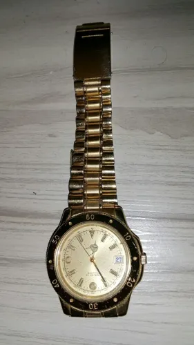 Relógio Mido quartz 50 meters dourado com pulseira original e numeração