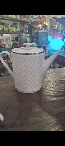 Jogo de porcelana antigo branco com prateado conforme fotos