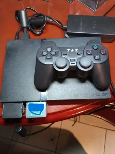 playstation 2 slim com jogos