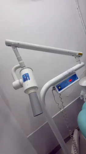 Rx periapical odontológico procion com laudo LCR UERJ
