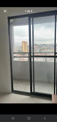 Porta balcão alumínio preto 1,36 x 2,20. Retirar na zona norte