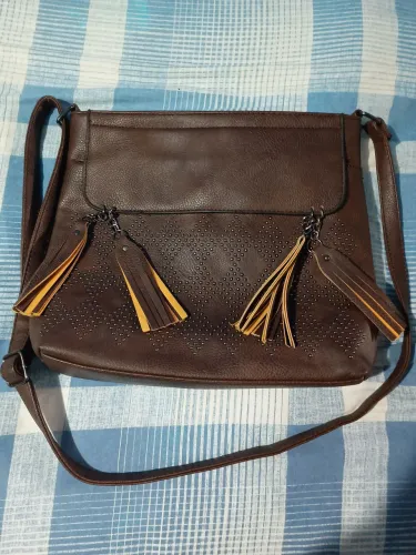 Bolca de couro sime novo ela tem 30 pôr 30 faço entrega