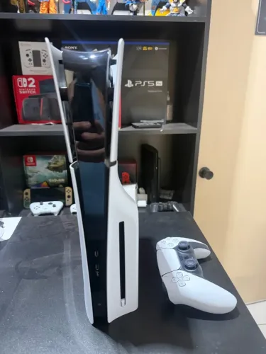 Ps5 slim com leitor seminovo aceitamos usado como entrada