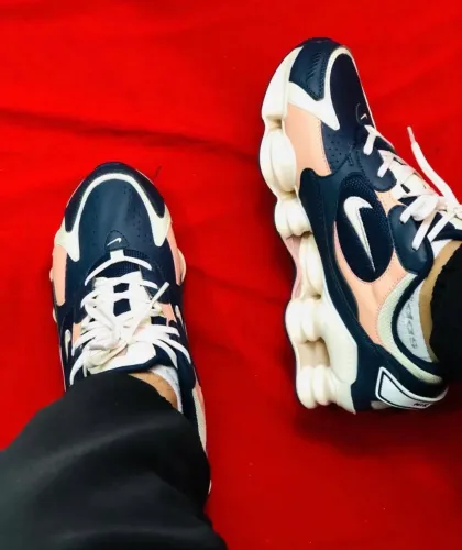 Tênis Nike 12 molas 