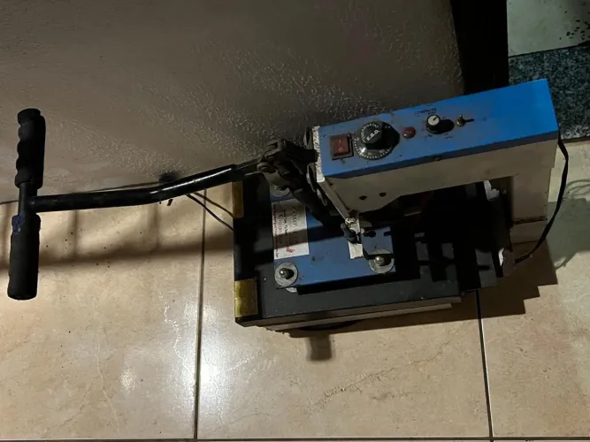 Máquina de estampar 