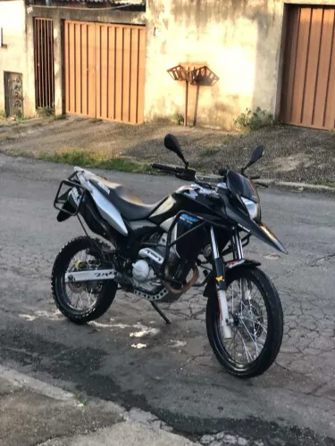 Moto perfeita recibo em branco no meu nome só pega e andar licenciamento pago 2026