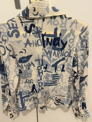 Blusa de seda Daslu