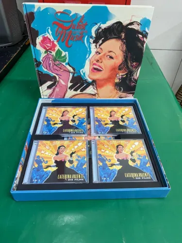 Livro e CDs