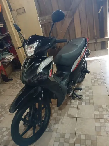 Moto de mulher. 