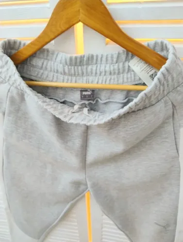Calça puma moletom evostrip m feminina 