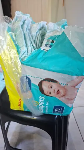 Vendo fralda pampers e mili ou troco por roupa de bebe menino