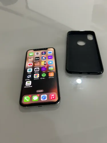 Vendo fone xs 64 gb excelente com película de gel,capinha nova
