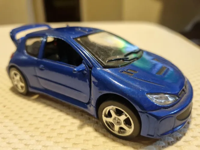 Miniatura Peugeot 206 WRC Azul Escala 1/32