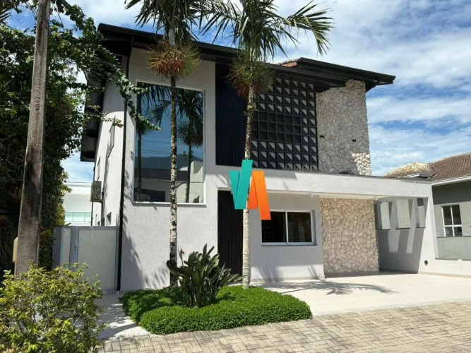 Sobrado com 3 dormitórios à venda, 357 m² por R$ 2.800.000,00 - Massaguaçu - Caraguatatuba