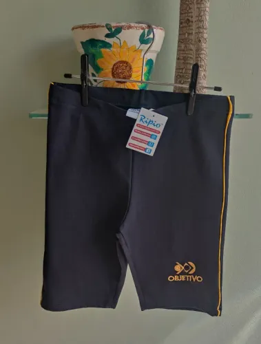 Lote uniformes Colégio Objetivo, peças novas e usadas .