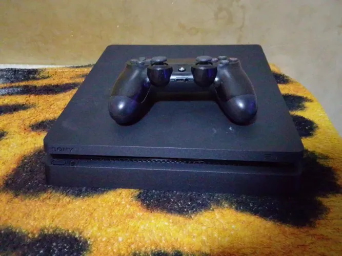 Vendo ps4 slin 800 gb para levar logo, entrego na residência