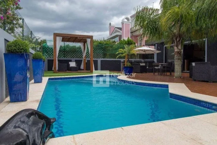 Casa Residencial à venda, Jurerê Internacional, Florianópolis - CA0481.