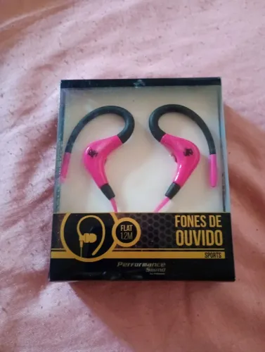 Fone de ouvido rosa novo na caixa
