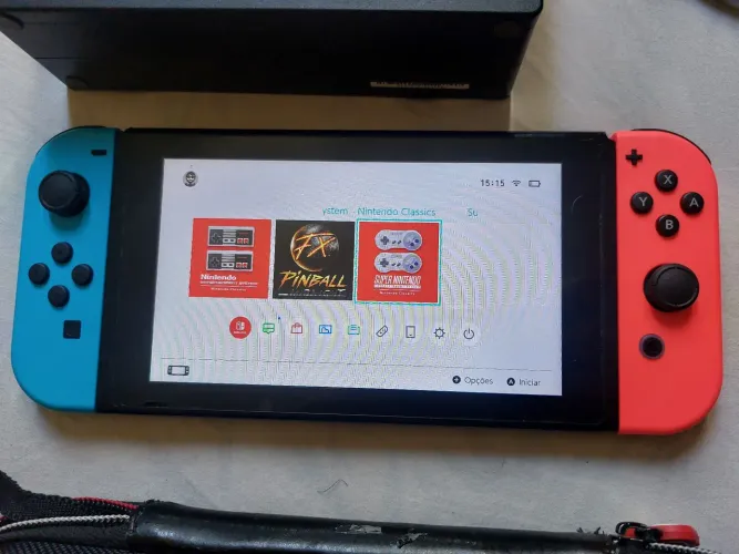 Vendo nintendo switch original com 4 jogos