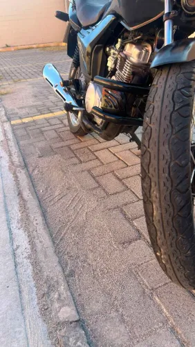 Vendo , troco ou alugo moto titan Honda  bem conservada 