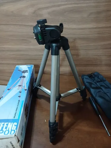 Tripé para câmera.