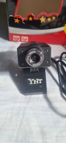 Vendo web cam semi nova