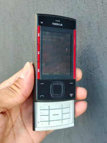 Celular antigo Nokia X3 Slide