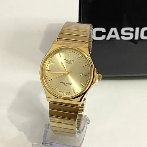 Relógio Casio vintage analógico dourado + caixa 