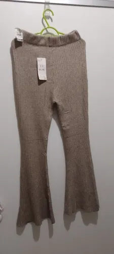 Calça Flare Tricô Canelada Bege