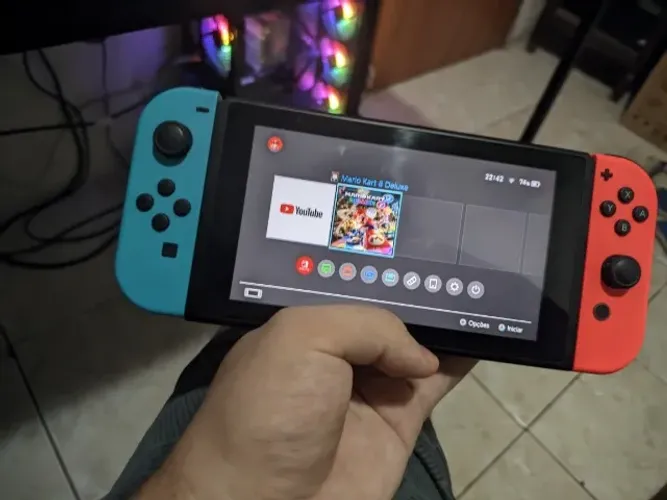 Nintendo Switch V2 com acessórios e jogo