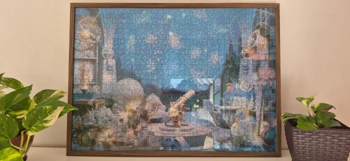 Quadro com quebra cabeça constelações 1000 peças.