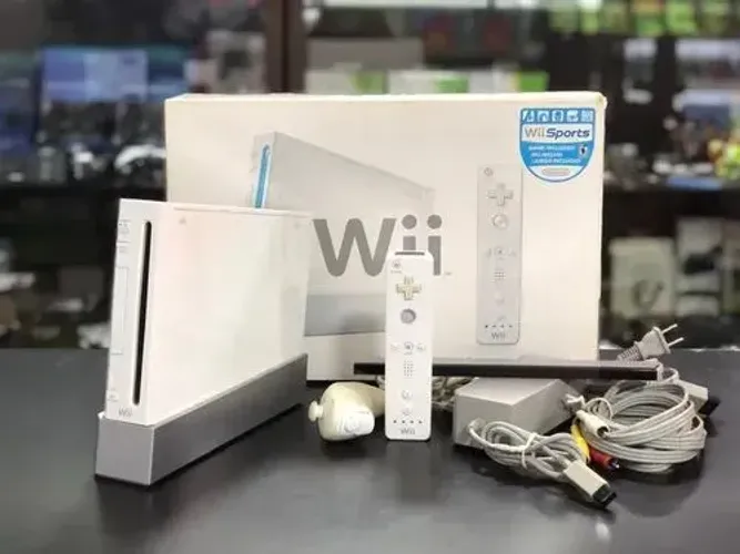 Nintendo Wii com caixa + guitarra warrior