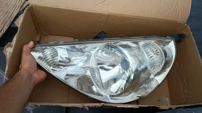 Farol Honda fit 2002 a 2008