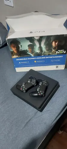 Vendo ps4 1tb com 2 controles Vendo por 1100 reais