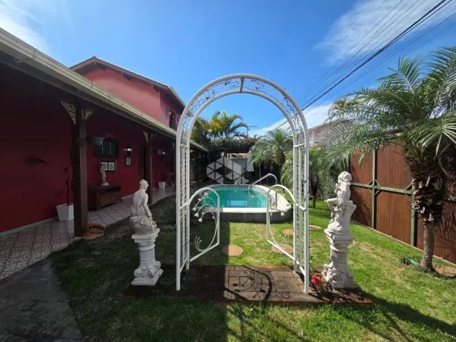 CASA Á VENDA NO RIO TAVARES COM 3 QUARTOS SENDO 2 SUÍTES 3 VAGAS DE GARAGEM NO RIO TAVARES