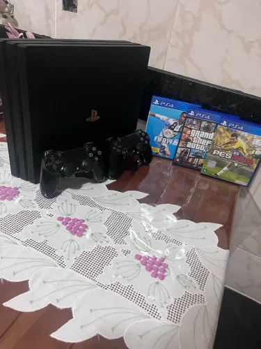 ps4 pro mais 2 controles originais e 3 jogos midia fisica