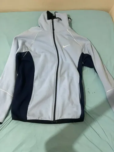 Conjunto nocta tech fleece