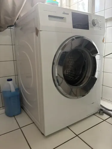 Máquina com problema no eixo do tripé