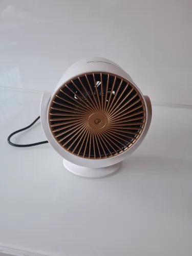 Mini Aquecedor Portátil com Design Moderno