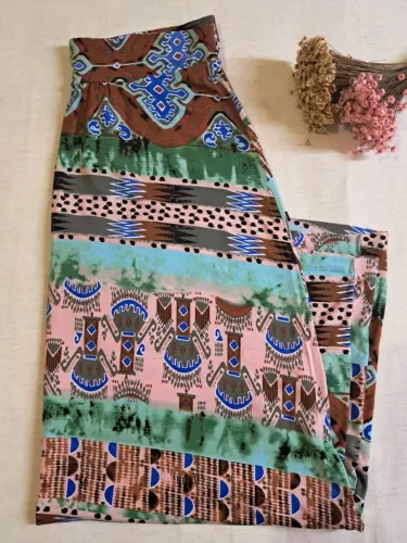 SAIA LONGA EM MALHA ESTAMPADA - SEMINOVA PERFEITA!