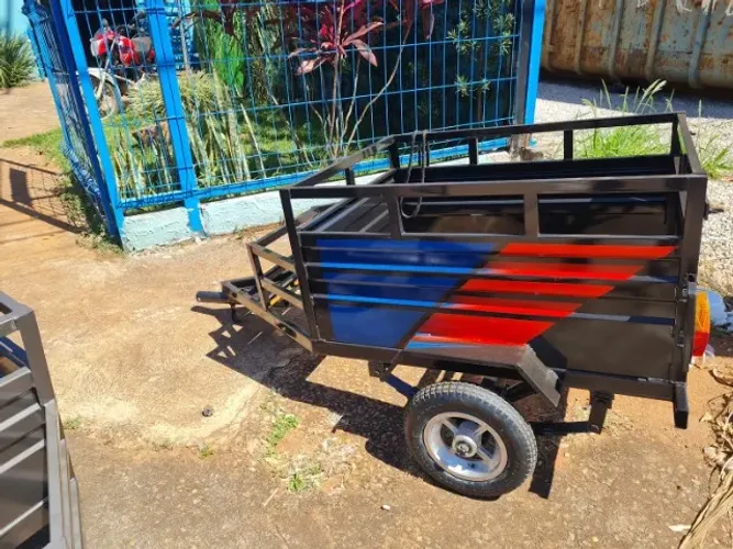 "Carretinha pra puxar em moto supermercado etc fechos de molas pra até 300kg fábricamos to