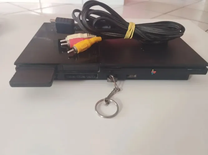 PS2 com vários jogos (18x no cartão de crédito)