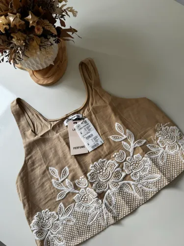 Blusa lança perfume bege M