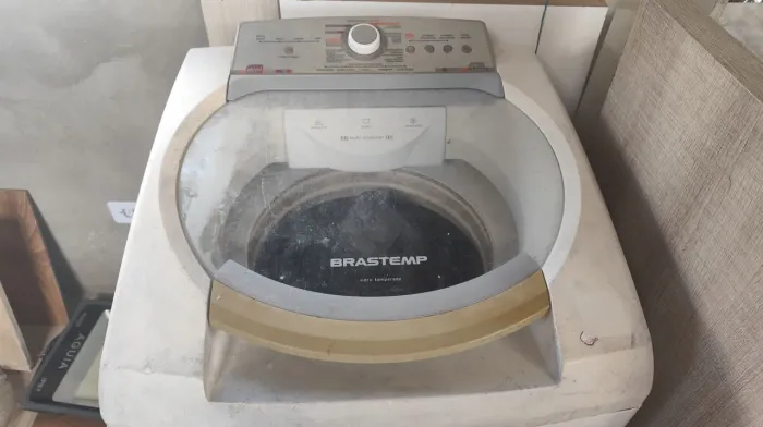 Máquina de lavar com defeito