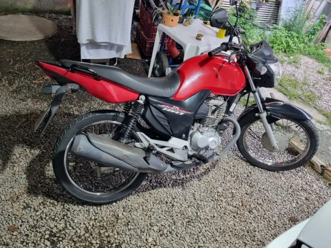 Moto único dono tirada zero chama