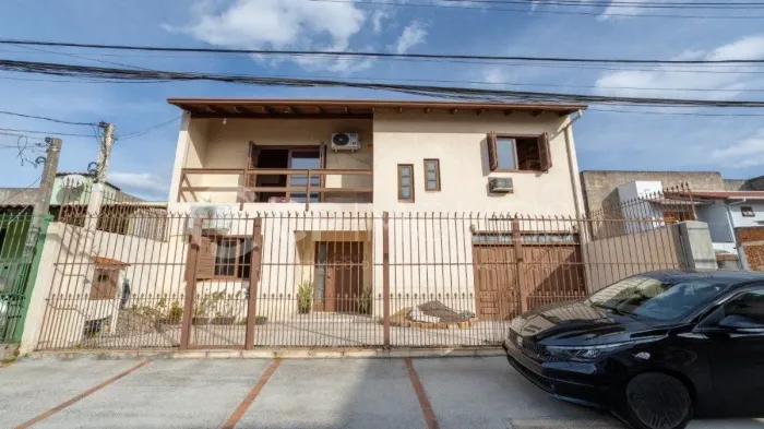 Casa em condomínio com 3 dormitórios e 2 vagas à venda no bairro São Sebastião em Porto Al